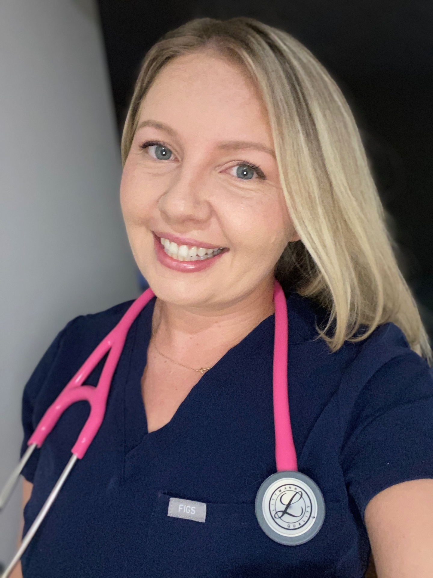 Dr. Maria Saba in scrubs with stethoscope